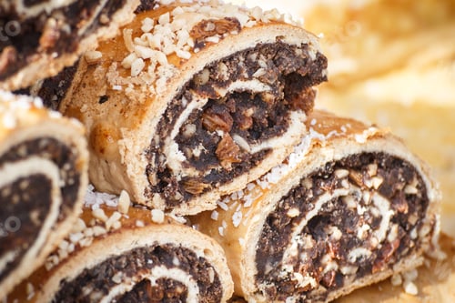 Preview: Portion of fresh homemade poppy seeds cake. Festive dessert