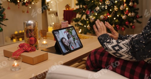 Preview: Asia happy woman relax smile laugh waving hand greet in digital tablet screen remote talk to child