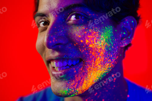 Preview: Fashion model with fluo painting on the face