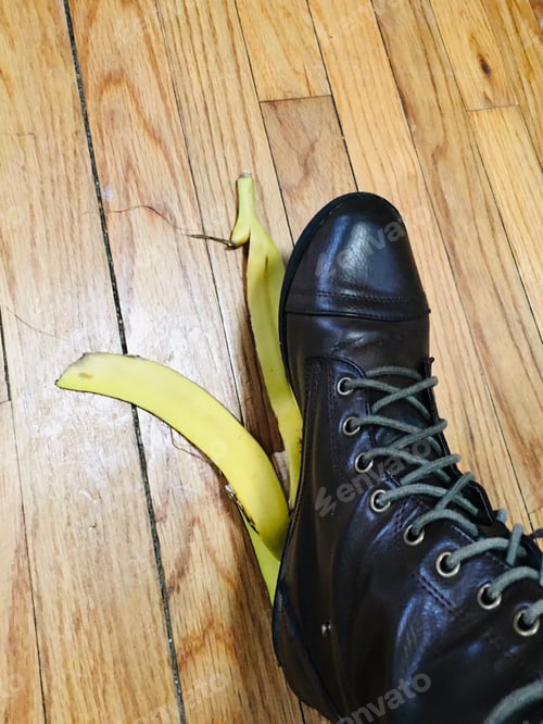 Preview: A foot about to step on a slippery banana peel