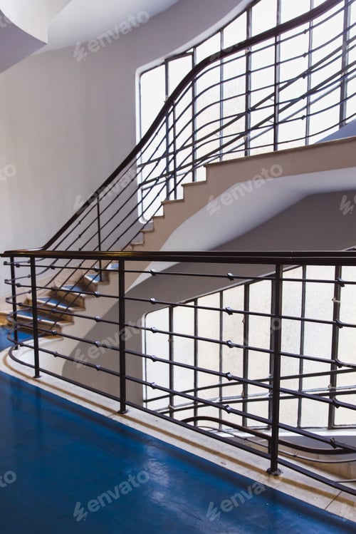 Preview: Old blue spiral staircase, spiral stairway inside an old house in Budapest, Hungary. Project
