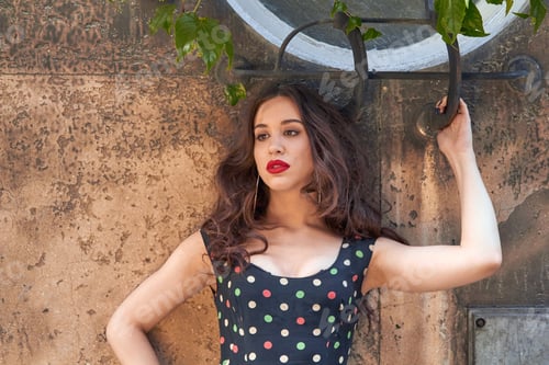 Preview: Elegant Young Woman Posing On The Street.