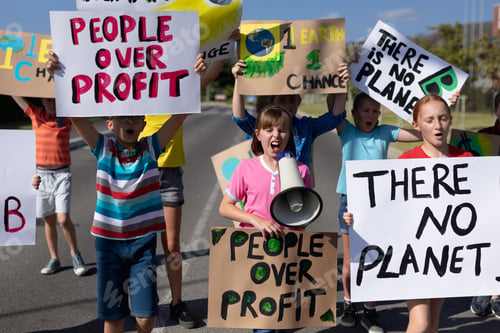 Preview: Group of elementary school pupils walking on a protest march