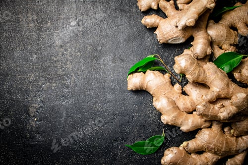 Preview: Fresh ginger root with leaves.