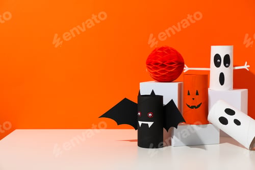 Preview: Paper Halloween mockups on orange background, space for text