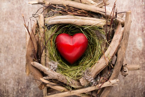 Preview: Easter heart decor on a wooden background. Pattern.