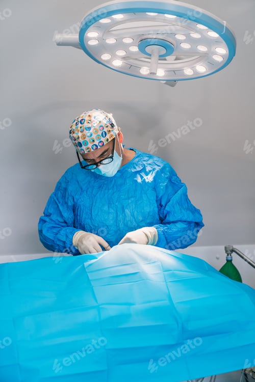 Preview: Surgeon Performing Operation in Operating Room