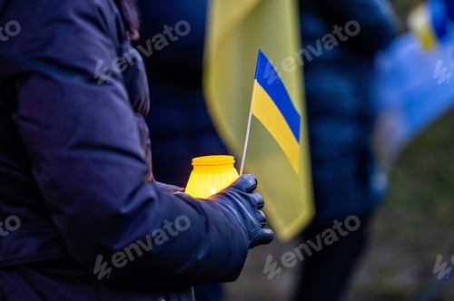 Preview: Candles on streets for peace in Ukraine, symbolising to stop the war, Stand with Ukraine, close-up