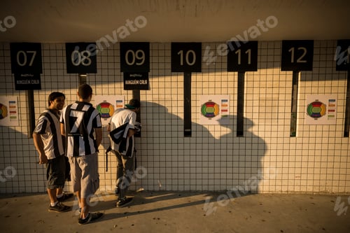 Preview: Friends at a shooting range under a golden sun.