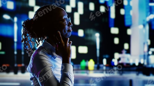 Preview: Woman talking over the phone and walking