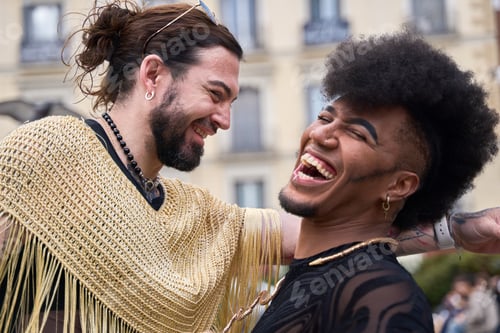 Preview: Gay couple laughing together outdoors, embracing diversity and love