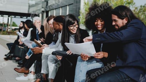 Preview: Multiracial business people working outdoor meeting outside the office