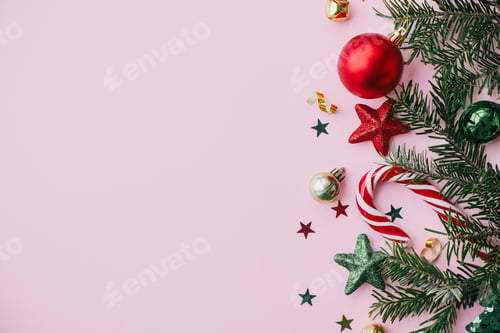 Preview: Modern Christmas Flat lay. Stylish christmas festive decorations on pink background. Merry Christmas