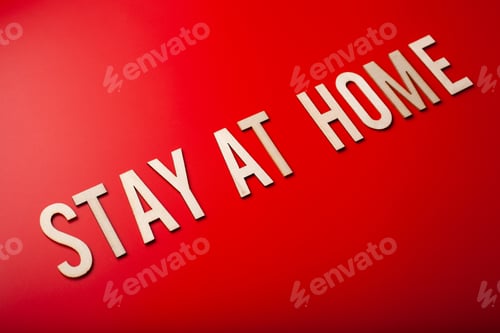 Preview: stay at home word text wooden letter on red background coronavirus covid-19
