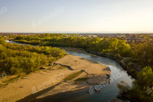 Preview: Aerial view of Ivano-Frankivsk city, Ukraine with Bystrytsia river and rural buildings in distance