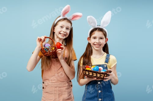Preview: Smiling Girls With Easter Baskets and Bunny Ears