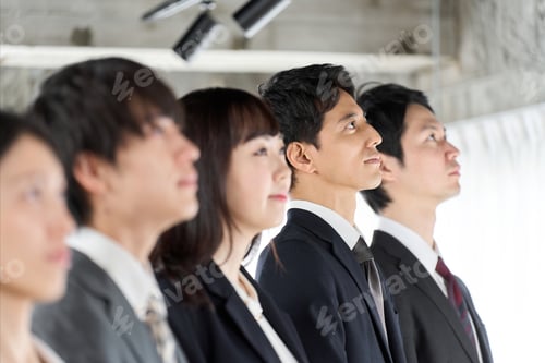 Preview: Business people lining up in the office