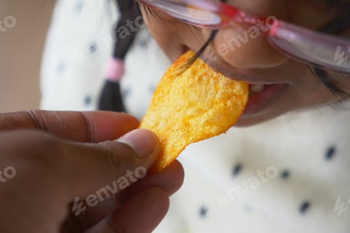 Preview: Sharing Crispy Chips Together A Joyful and Fun Moment Between Family and Kids at Home