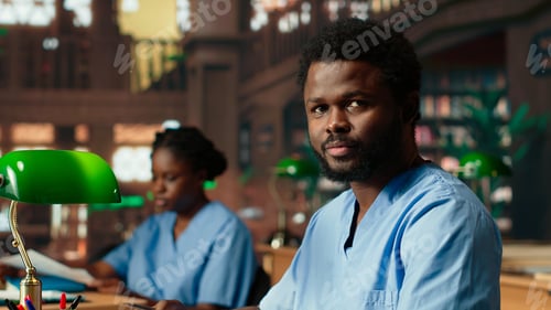 Preview: African american medical student documenting on medical practice notes