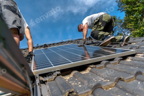 Preview: Men worker installing solar photovoltaic panels on roof, alternative energy, saving resources and