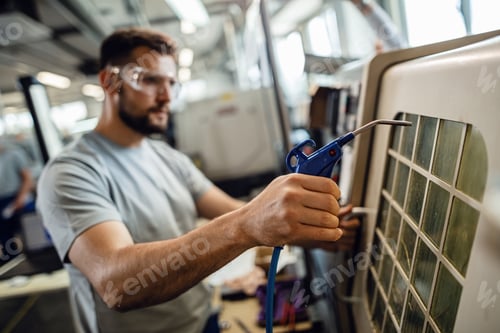 Preview: Close up of worker at industrial production line facility.