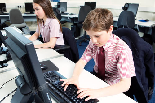 Preview: Students using computer in classroom