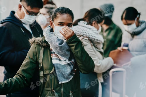 Preview: Shot of a group of young people wearing masks while travelling in a foreign city