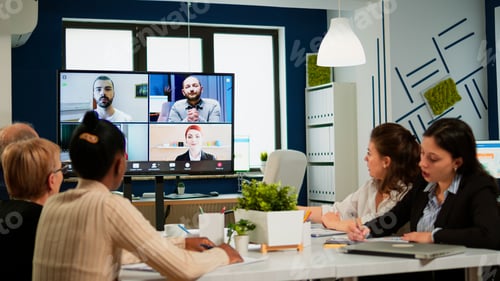 Preview: Emplyees workers having webcam conference with coworkers speaking on video call