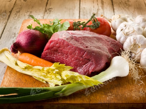 Preview: meat with vegetables ingredients over cutting board
