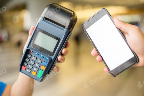 Preview: Woman pay with cellphone by NFC technology