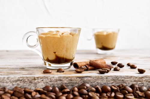 Preview: Traditional Italian dessert coffee cream in a glass cups on wooden table.