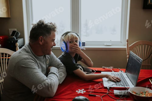 Preview: Father and Child at Computer at Home