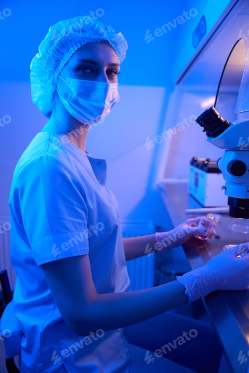 Preview: Researcher is posing for camera in lab setting