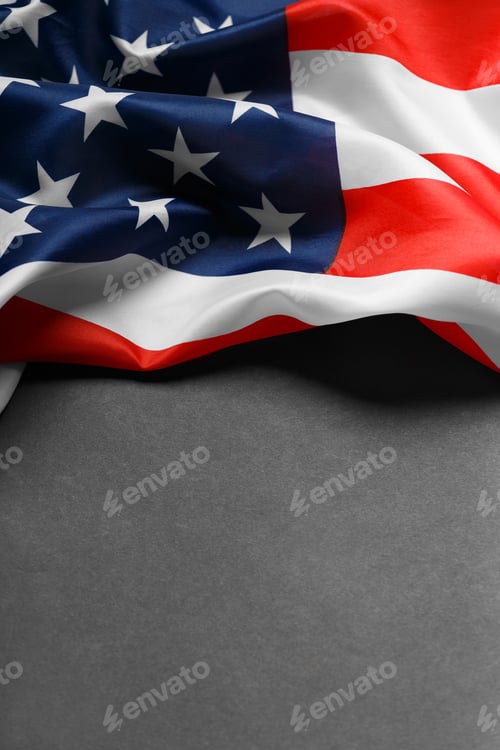 Preview: American flag on a black background, copy space. Symbol of independence, patriotism.