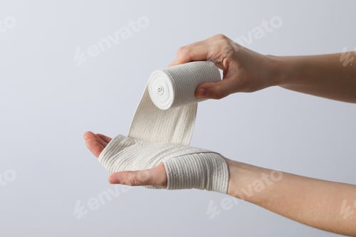 Preview: Concept of hand injury help with elastic bandage