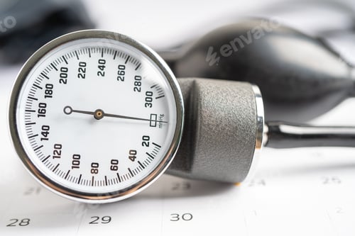 Preview: Blood pressure on calendar background.