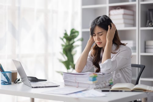Preview: Asian women are stressed or has sore throat at office while working on laptop, Tired asian businessw
