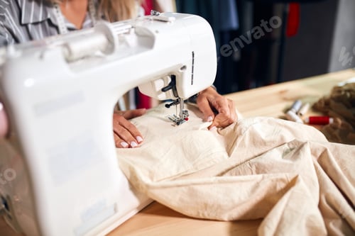 Preview: modern sewing machine. close up photo.