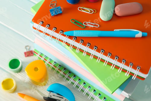 Preview: School supplies on white wooden table, closeup and space for text