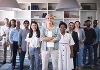 Preview: Portrait of a diverse group of businesspeople standing together in an office