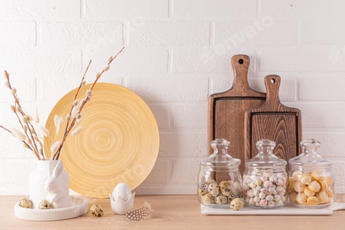 Preview: Kitchen wooden countertop with kitchen utensils and festive decorations for the Easter holiday