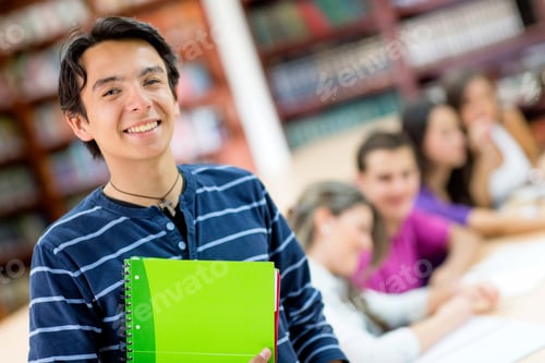 Preview: Happy Male Student Smiling With A Group At The Background