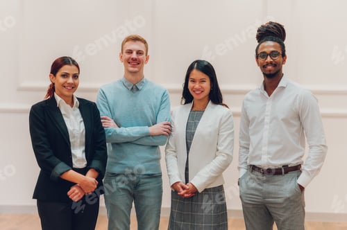 Preview: Portrait of a successful diverse business people posing in an office