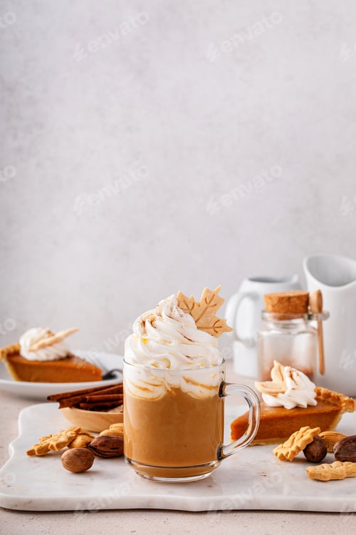Preview: Pumpkin spice latte topped with whipped cream and cinnamon