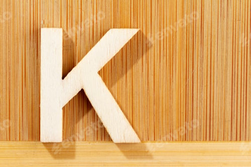 Preview: Letter K of wood-made alphabet, top view and space for text