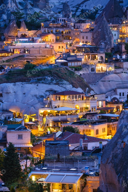 Preview: Goreme, Cappadocia, Turkey. View of the evening city from the mountain. Bright evening city.