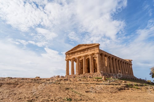 Preview: Ancient building with columns under cloudy sky