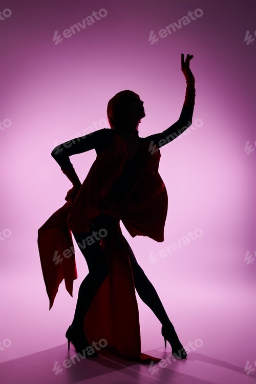 Preview: Vibrant Young Drag Queen Posing Elegantly Against a Pink Gradient Background at Night
