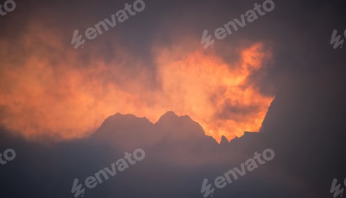 Preview: Burning fire at sunrise in the mountains
