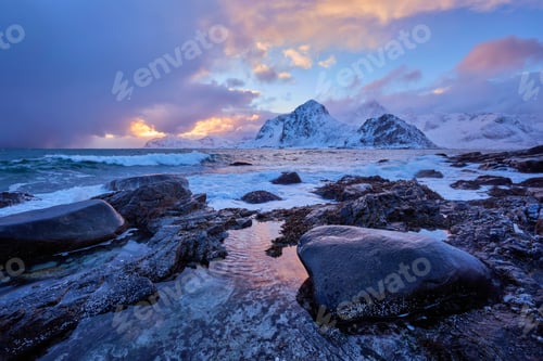 Preview: Coast of Norwegian sea on rocky coast in fjord on sunset